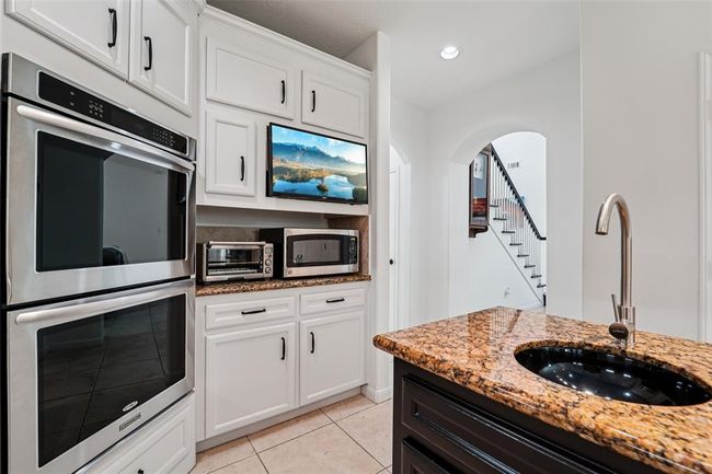 Built-in smart TV, microwave, and refrigerator are included! | Image 12