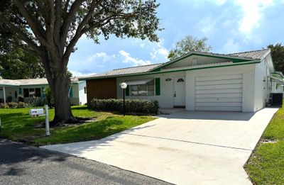 UPDATED LAKEVIEW MODEL WITH VIEW OF WATER***2 BEDROOM 2 BATH 1 CAR GARAGE***DOUBLE WIDE DRIVEWAY | Image 1