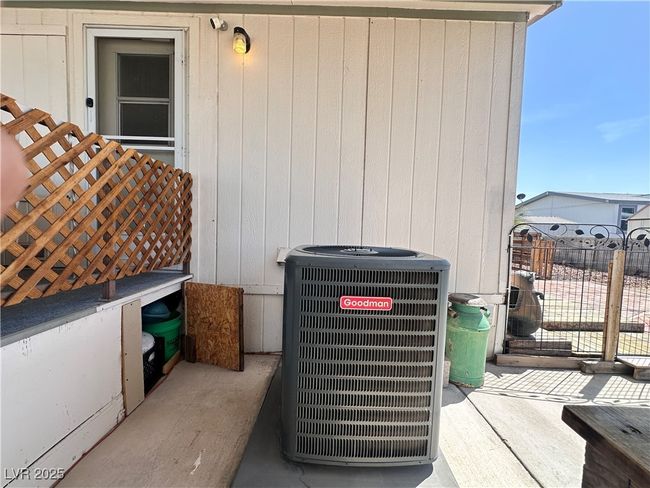 Exterior details with fence and central AC unit | Image 7
