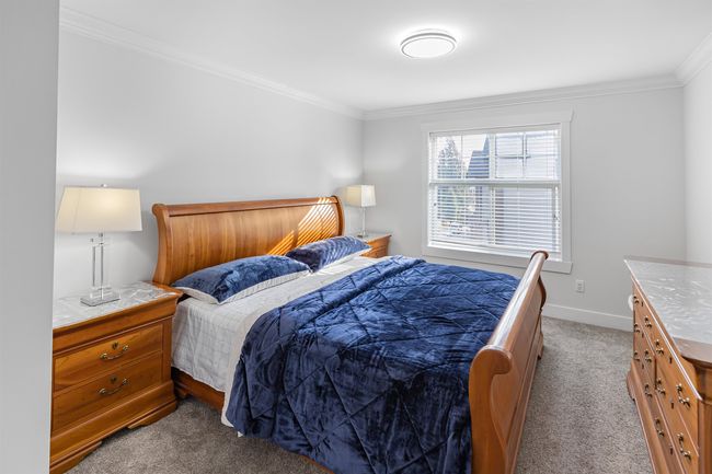 Carpeted Primary bedroom featuring ornamental molding and baseboards | Image 11