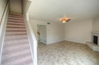 538 - Staircase at front entry and living room | Image 3