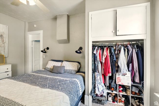 Bedroom featuring a closet | Image 10