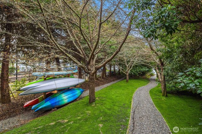 The property offers shared storage for kayaks and paddleboards, providing a convenient and secure space for residents to store their watercraft and enjoy easy access to aquatic adventures. | Image 20