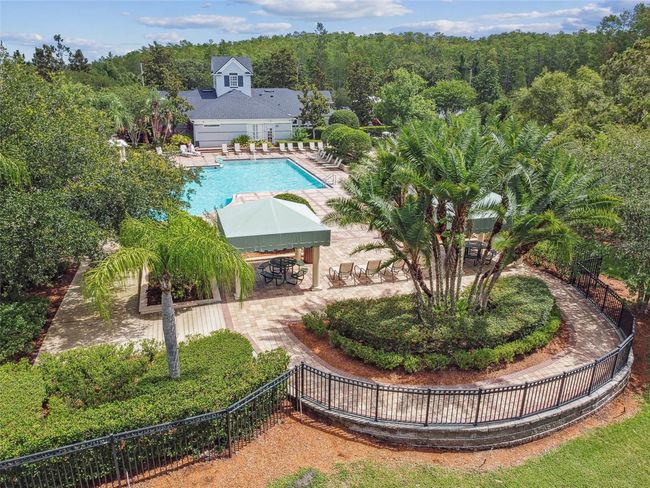 Spring Isle offers resort-style amenities with low HOA fees of only $243/month, which cover the roof, exterior paint, and lawn maintenance—making this a true low-maintenance home. Community amenities include a sparkling pool, playground, dog park, and a fully equipped fitness center. | Image 31
