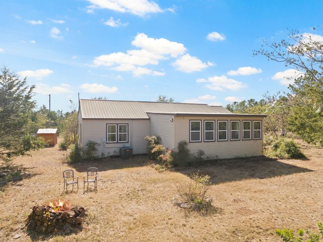 View of front of home featuring central AC | Image 23
