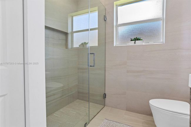 3848 Oak Ridge Cir, House other with 4 bedrooms, 3 bathrooms and null parking in Weston FL | Image 39