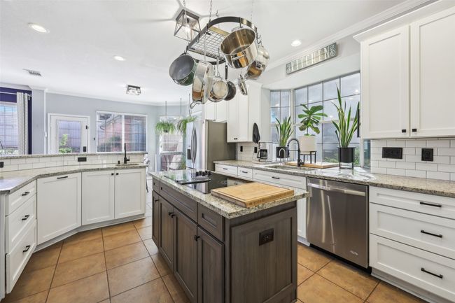 This updated kitchen has so much storage. Check out that large sink plus a bonus prep sink! | Image 9