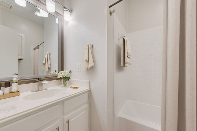 Bathroom with vanity and shower / bath combination | Image 12