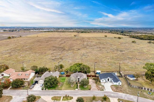 Aerial view of property's location featuring rural landscape | Image 8