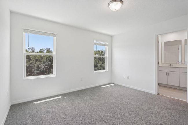 16403 Bird Of Paradise Ave, Townhouse with 3 bedrooms, 3 bathrooms and null parking in CLERMONT FL | Image 22
