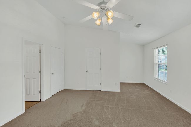 This is the main bedroom with two closets. One of them is a large walk in closet | Image 19