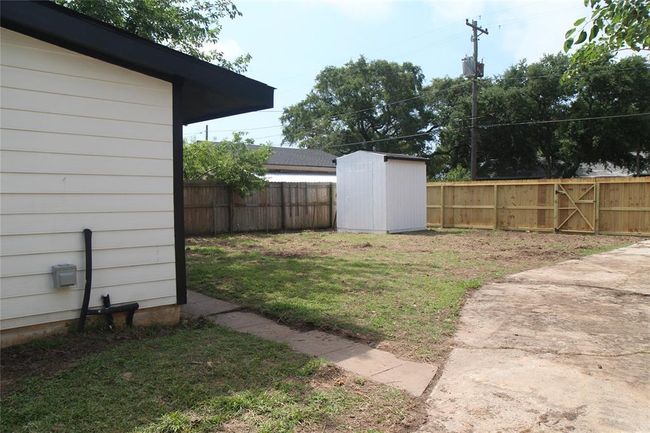 View of the backyard with your storage shed. | Image 29