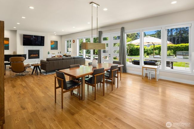 Looking back toward the living area, the dining space could accommodate even a much larger table oriented in either direction. | Image 12