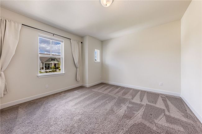 Spacious bedroom on second level. | Image 20