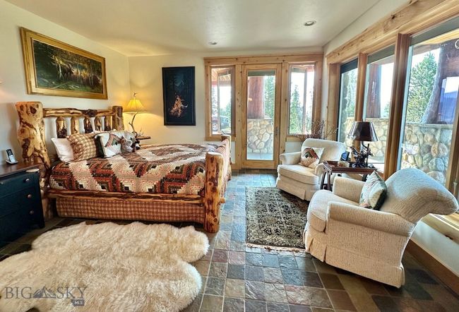 Bedroom 2 Suite with access to outside patio area. | Image 52