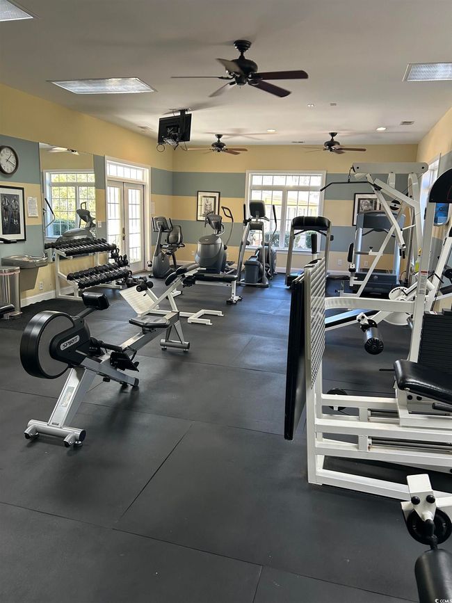 Exercise room featuring baseboards and a healthy amount of sunlight | Image 24