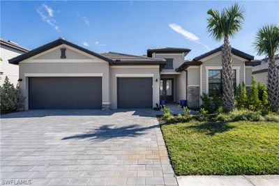 11387 Canopy Loop, House other with 3 bedrooms, 3 bathrooms and null parking in Fort Myers FL | Image 1