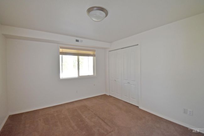 Unfurnished bedroom featuring carpet floors and a closet | Image 29