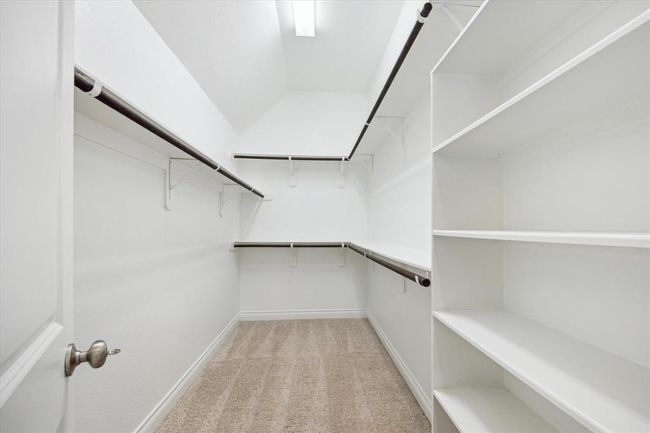 one of two walk-in closets in the primary. | Image 16