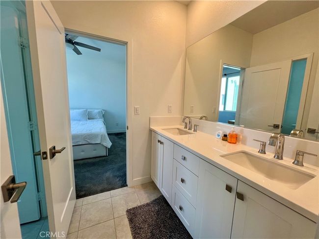 View of the 3rd bedroom from its Jack and Jill bathroom. | Image 24
