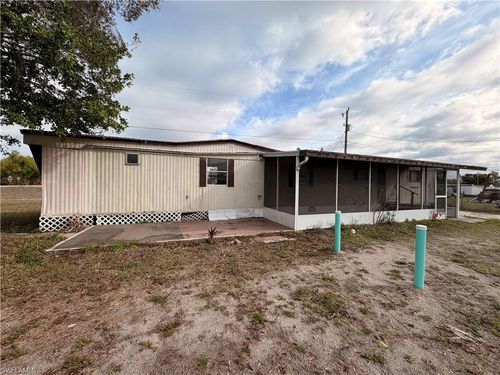 7897 Suncoast Dr, NORTH FORT MYERS, FL, 33917-1943 | Card Image