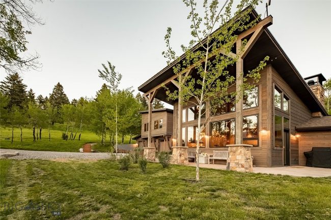Vaulted ceilings and abundant windows face the commanding Bridger Range. | Image 8