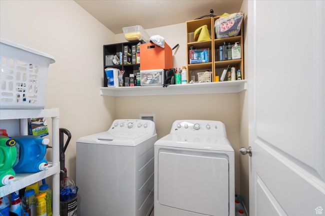 Washroom featuring separate washer and dryer | Image 14