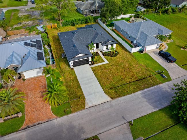 1765 Sw Columbia St, House other with 5 bedrooms, 3 bathrooms and null parking in Port St. Lucie FL | Image 35