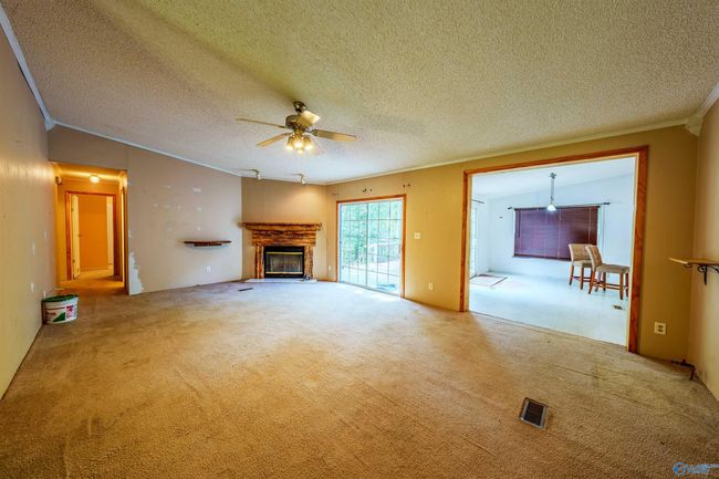 Features vaulted ceiling & fireplace | Image 10