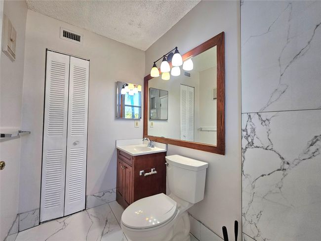 LINEN CLOSET IN BATHROOM | Image 14