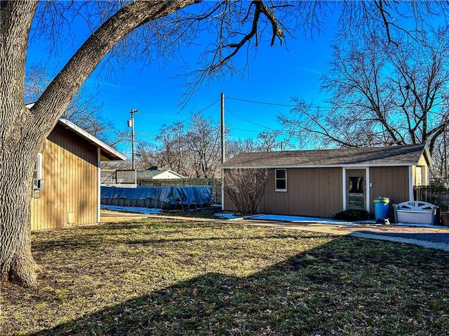 View of yard featuring fence | Image 4