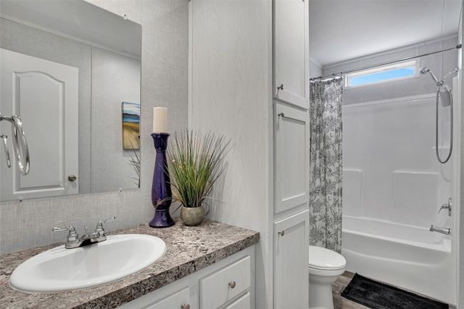 Guest bathroom. Shower features Aquasana water filter | Image 22