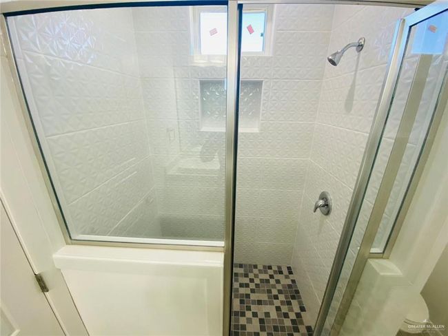 Full bathroom featuring a shower stall | Image 9