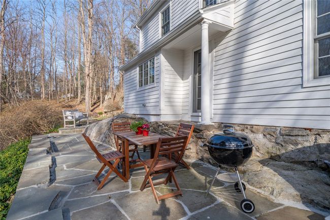 Side flagstone patio for al freso dining | Image 25