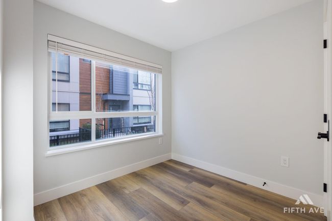 Empty room featuring baseboards and wood finished floors | Image 34