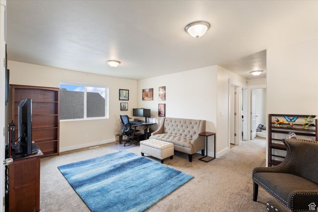 Loft featuring carpet flooring and an office area | Image 16