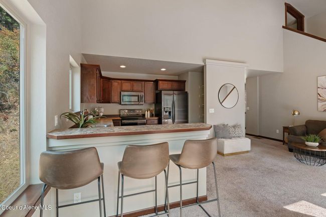 with a breakfast bar for extra seating! | Image 27