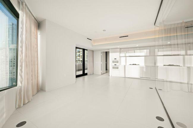 Empty room with light tile patterned floors | Image 7
