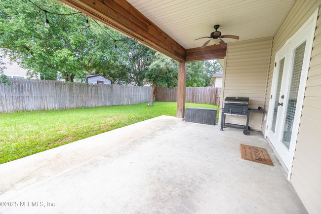 11760 Huckleberry Trl E, House other with 4 bedrooms, 2 bathrooms and null parking in MACCLENNY FL | Image 4