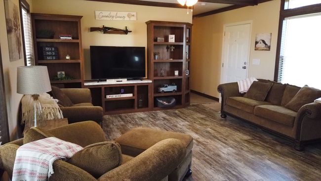 Living room featuring wood finished floors | Image 24