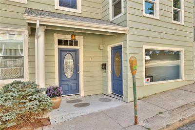 Entrance offers separate doorways for tenants/residents | Image 2