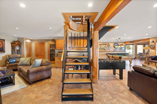 Lower level family area, entertaining, game, living room. | Image 63