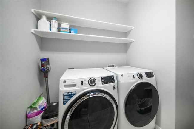 Washroom featuring separate washer and dryer | Image 8