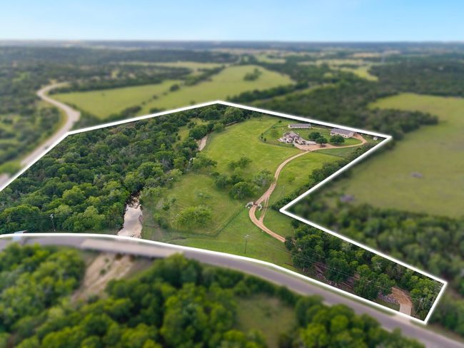 Aerial view of property and surrounding area featuring property boundaries highlighted. | Image 36