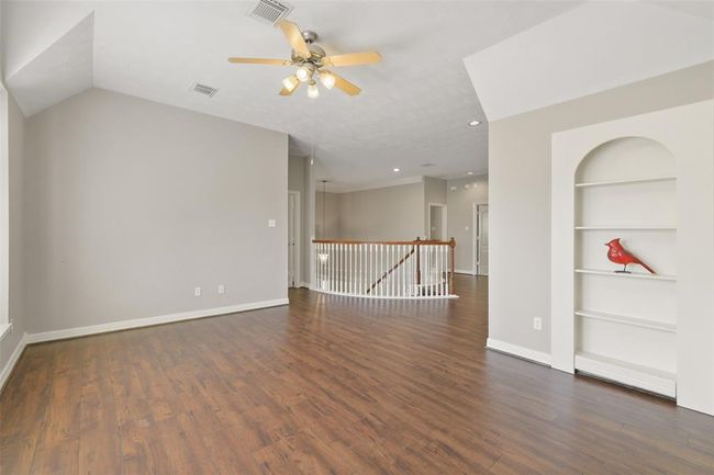 Gameroom with built-ins. Great hidden storage area. Perfect for security camera monitoring, holiday presents etc. | Image 28