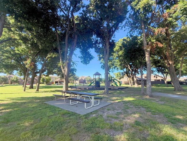 Park with playground, picnic tables, additional parking your your family get together and stunning shade trees | Image 39