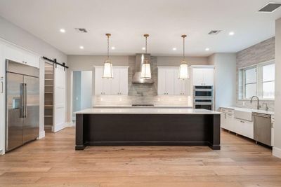 Stunning kitchen with expansive island | Image 2