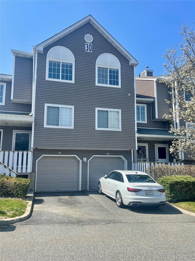 View of front of property with driveway and a garage | Image 30