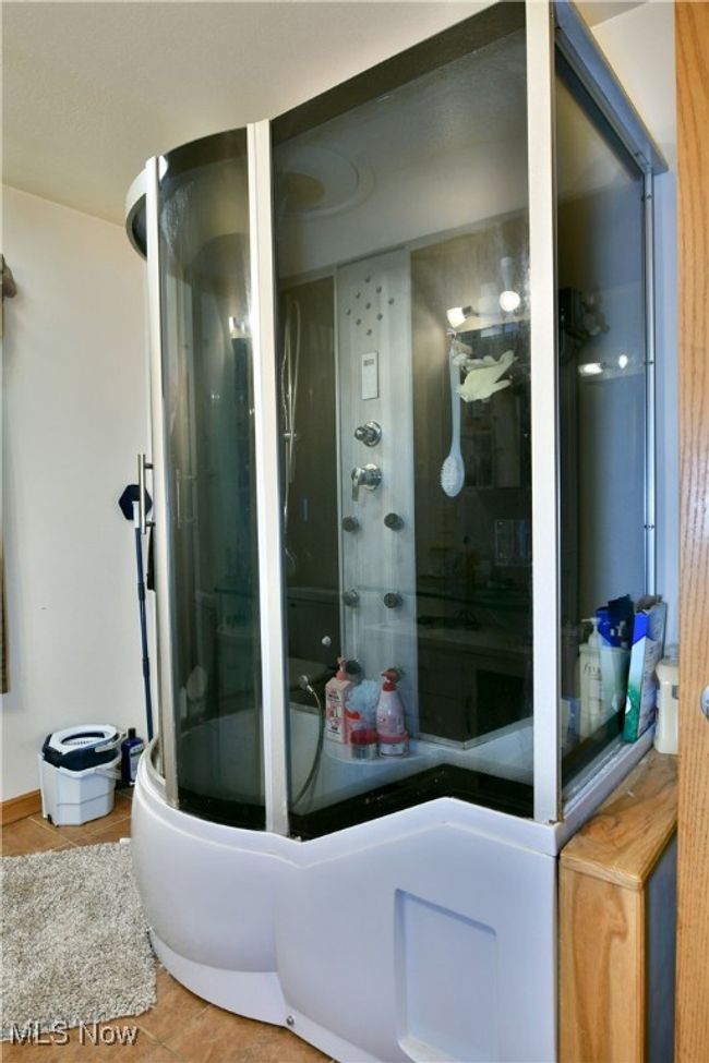 Bathroom with tile patterned flooring | Image 24