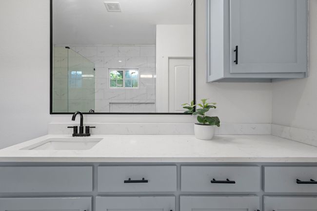 Full bath featuring vanity and a shower stall | Image 26